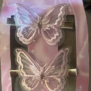 pair of purple butterfly clips